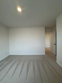 309 Amsterdam Way Hampton, GA 30228 - Photo 39 of 53 wooden floor and cabinet in an empty room