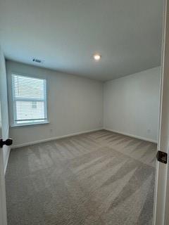 309 Amsterdam Way Hampton, GA 30228 - Photo 41 of 53 an empty room with a window