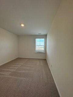 309 Amsterdam Way Hampton, GA 30228 - Photo 45 of 53 an empty room with a window