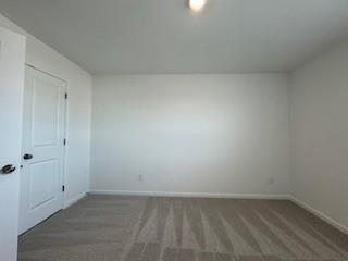 309 Amsterdam Way Hampton, GA 30228 - Photo 46 of 53 a view of an empty room