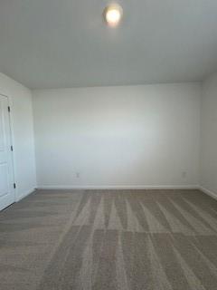 309 Amsterdam Way Hampton, GA 30228 - Photo 47 of 53 a view of an empty room