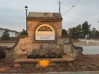 309 Amsterdam Way Hampton, GA 30228 - Photo 53 of 53 a view of a water fountain in front of a house