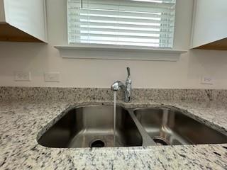 309 Amsterdam Way Hampton, GA 30228 - Photo 7 of 53 a close view of sink and washing machine