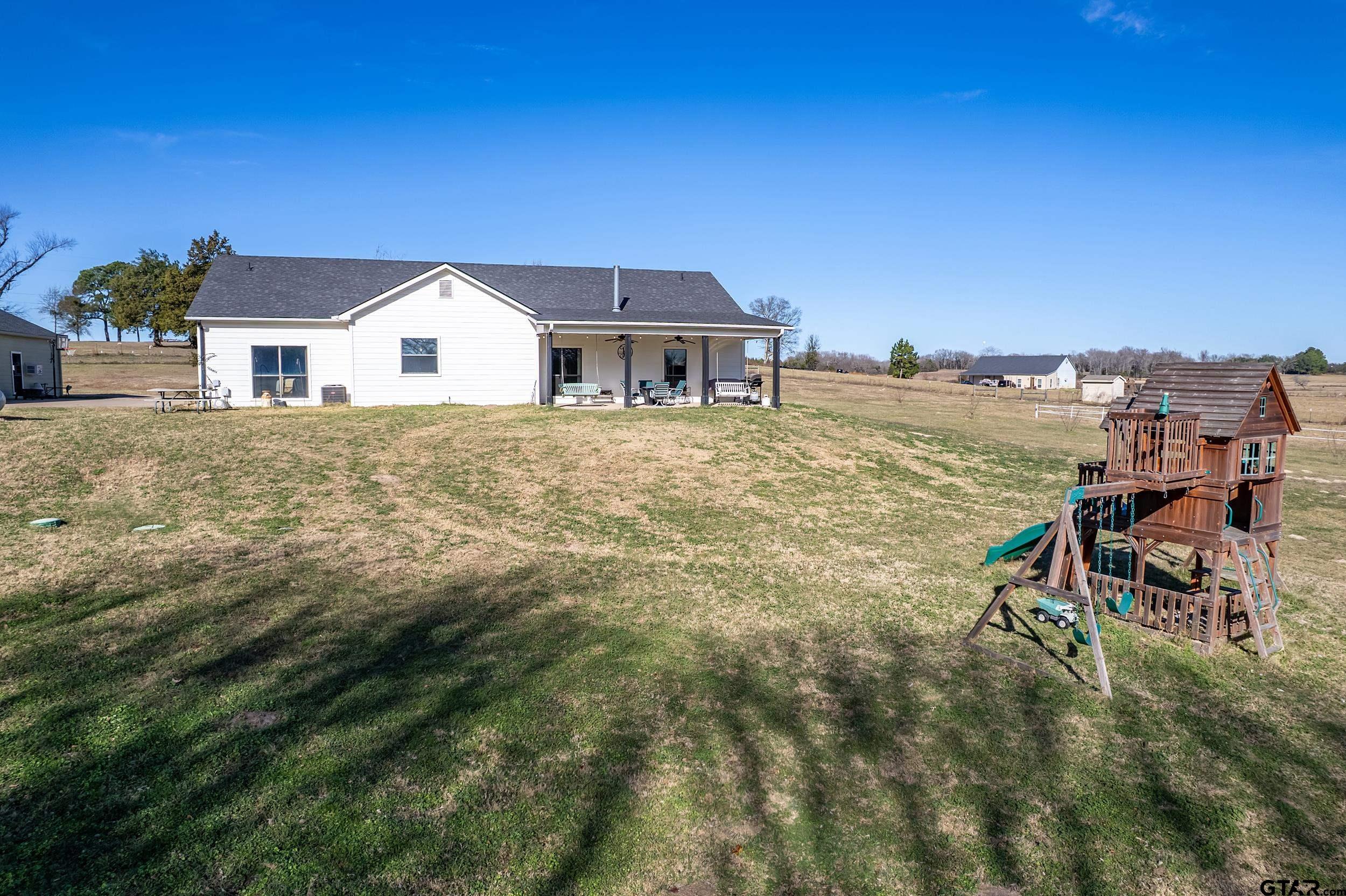 488 VZ County Road Ben Wheeler, TX 75754 - Photo 11 of 47 a view of a house with a yard