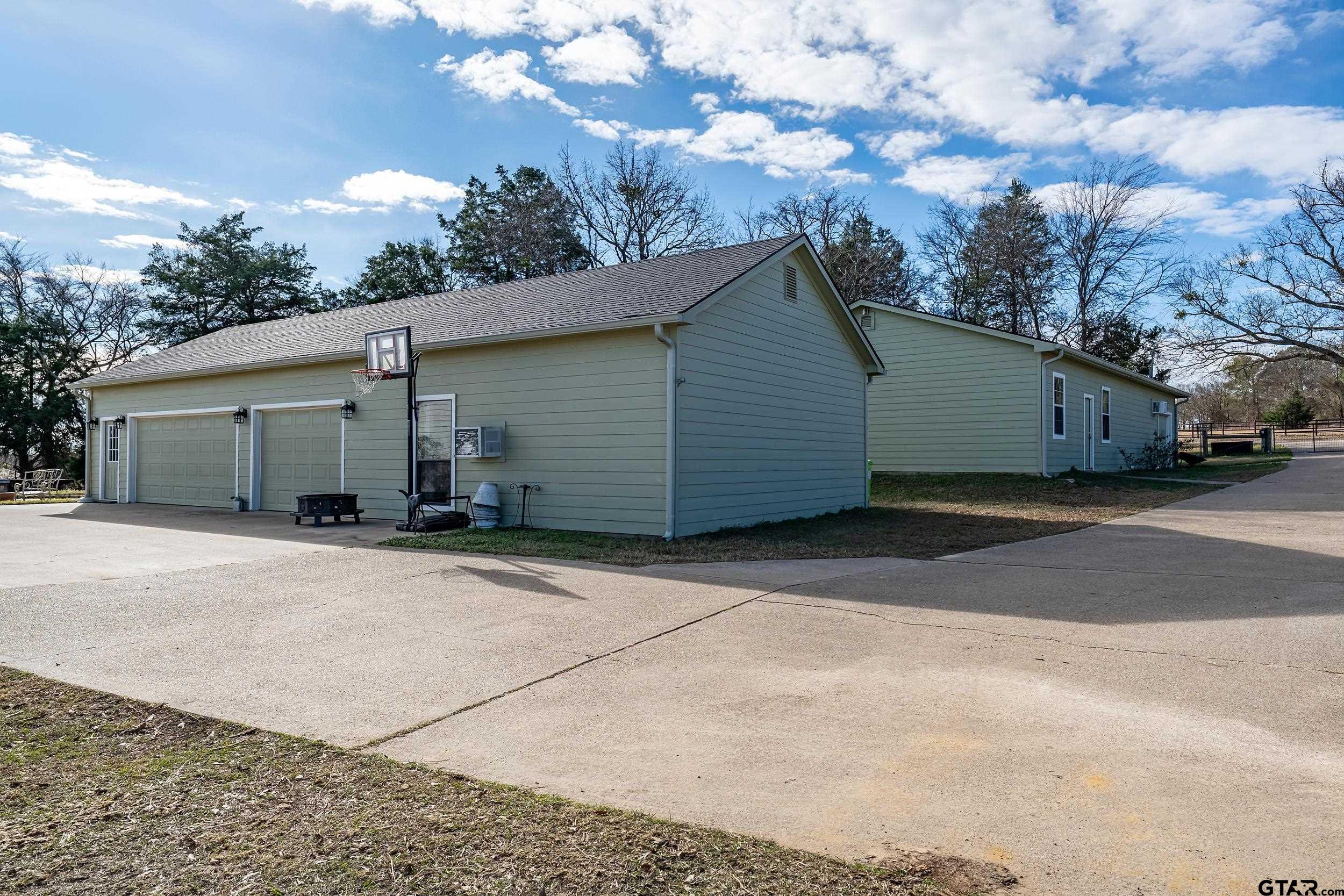 488 VZ County Road Ben Wheeler, TX 75754 - Photo 14 of 47 a view of a house with a backyard and trees