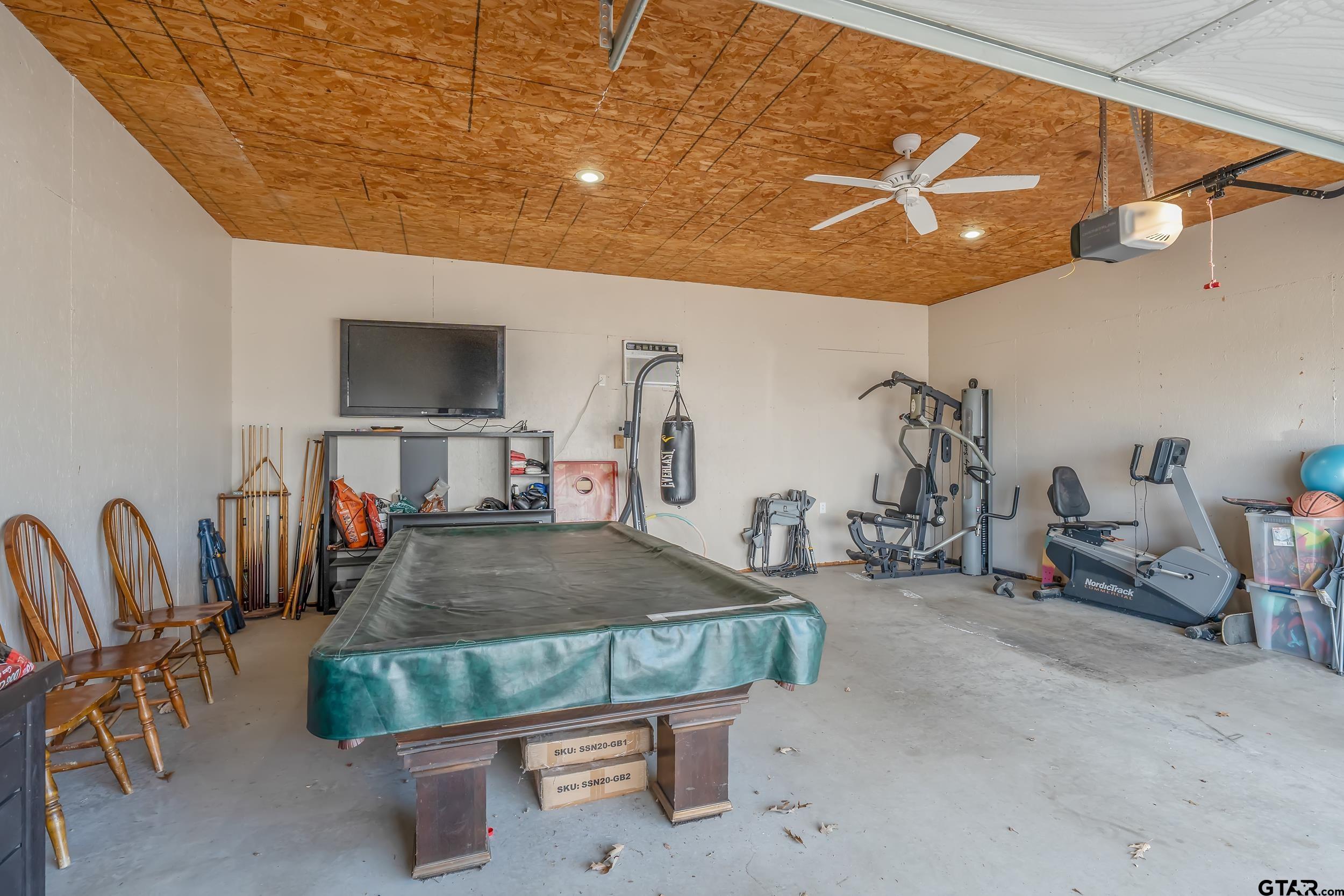 488 VZ County Road Ben Wheeler, TX 75754 - Photo 15 of 47 a room with furniture and a flat screen tv