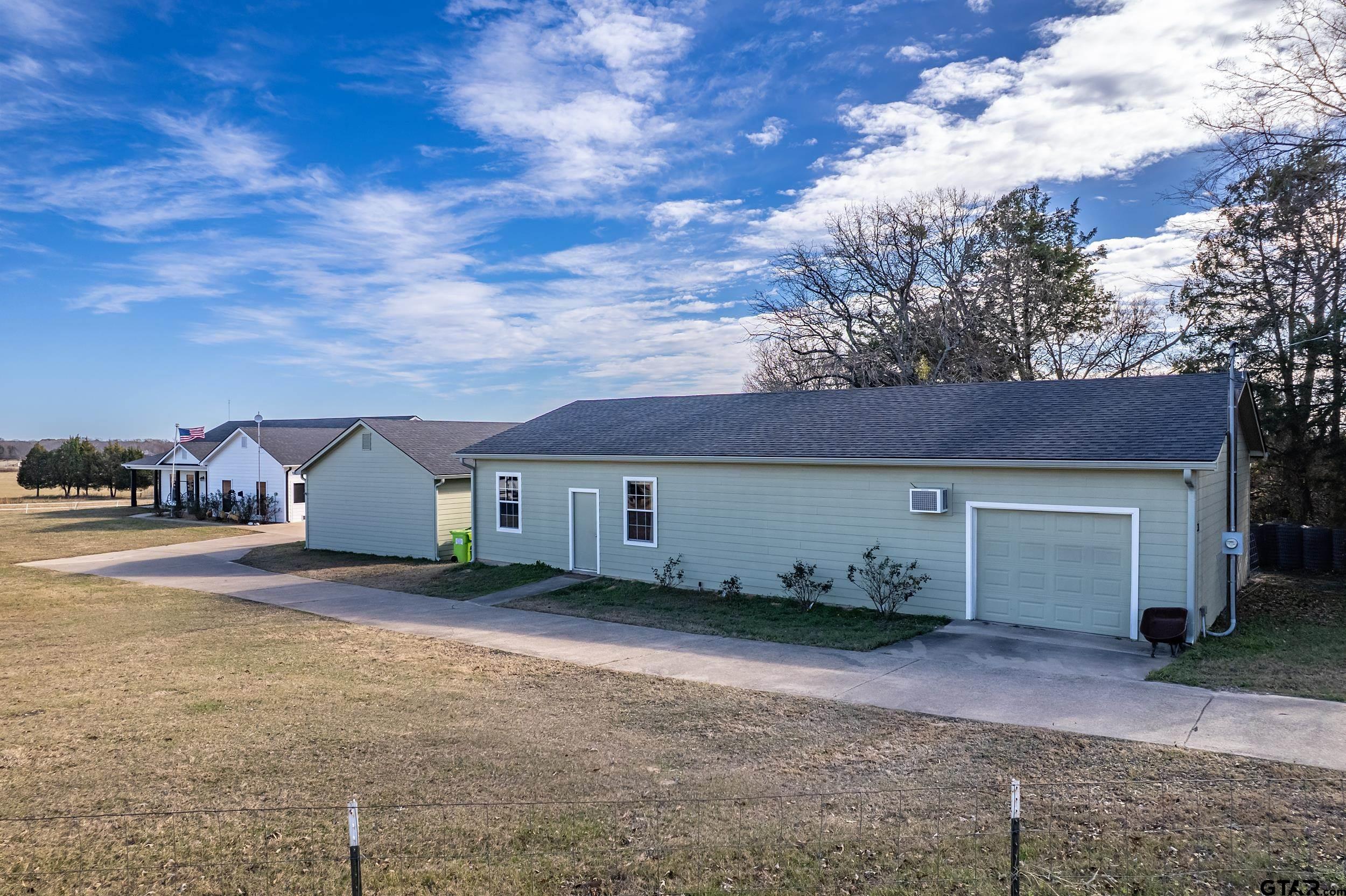 488 VZ County Road Ben Wheeler, TX 75754 - Photo 19 of 47 a view of a house with a backyard