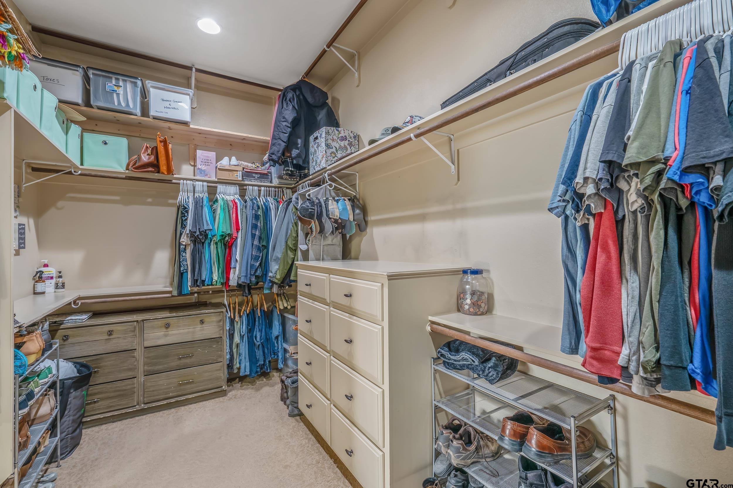 488 VZ County Road Ben Wheeler, TX 75754 - Photo 2 of 47 a view of walk in closet with clothes and shoes