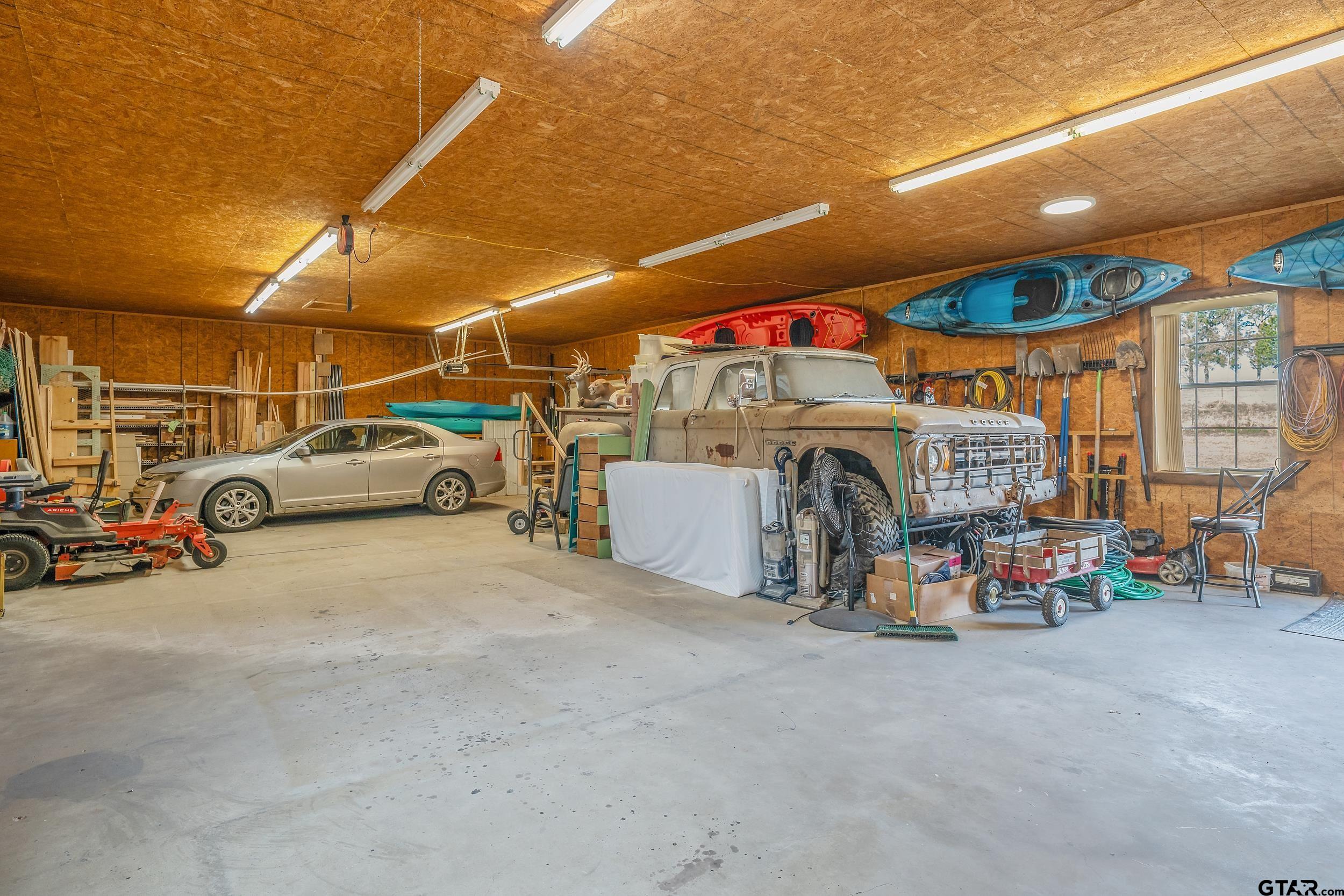 488 VZ County Road Ben Wheeler, TX 75754 - Photo 22 of 47 a view of parking garage with cars