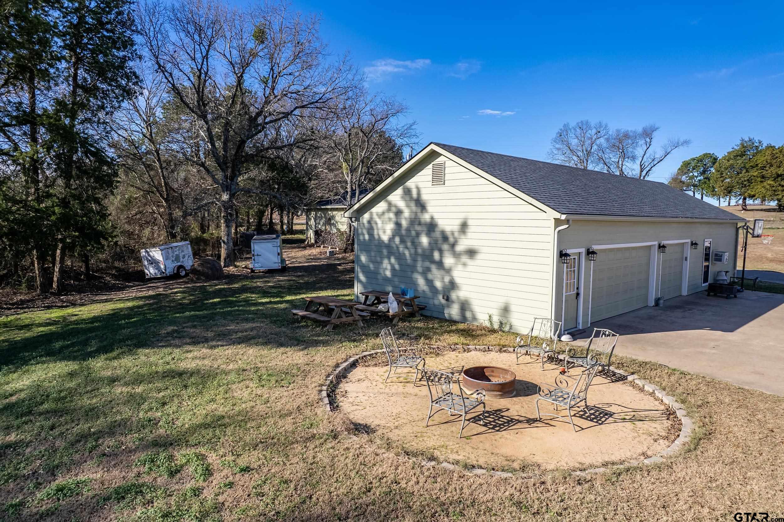488 VZ County Road Ben Wheeler, TX 75754 - Photo 26 of 47 a view of a house with a yard
