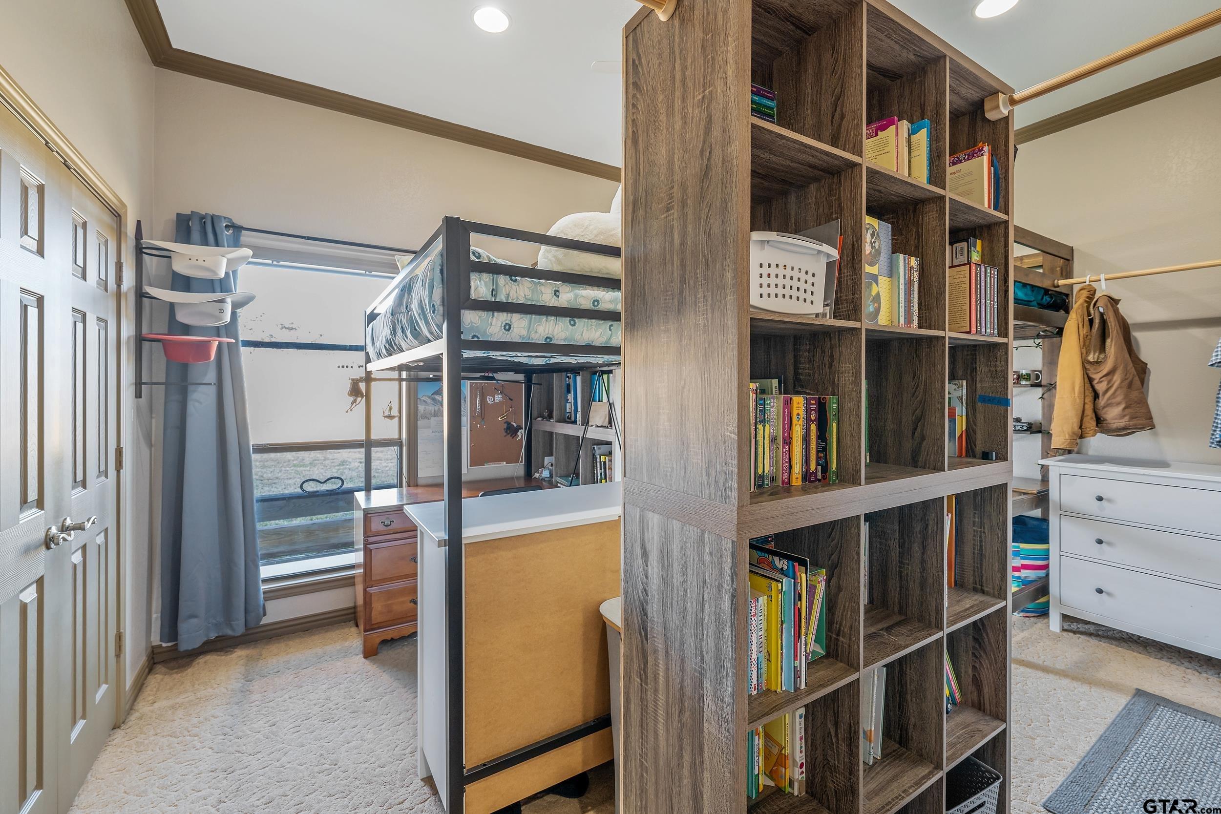 488 VZ County Road Ben Wheeler, TX 75754 - Photo 3 of 47 a view of walk in closet with clothes and shoes
