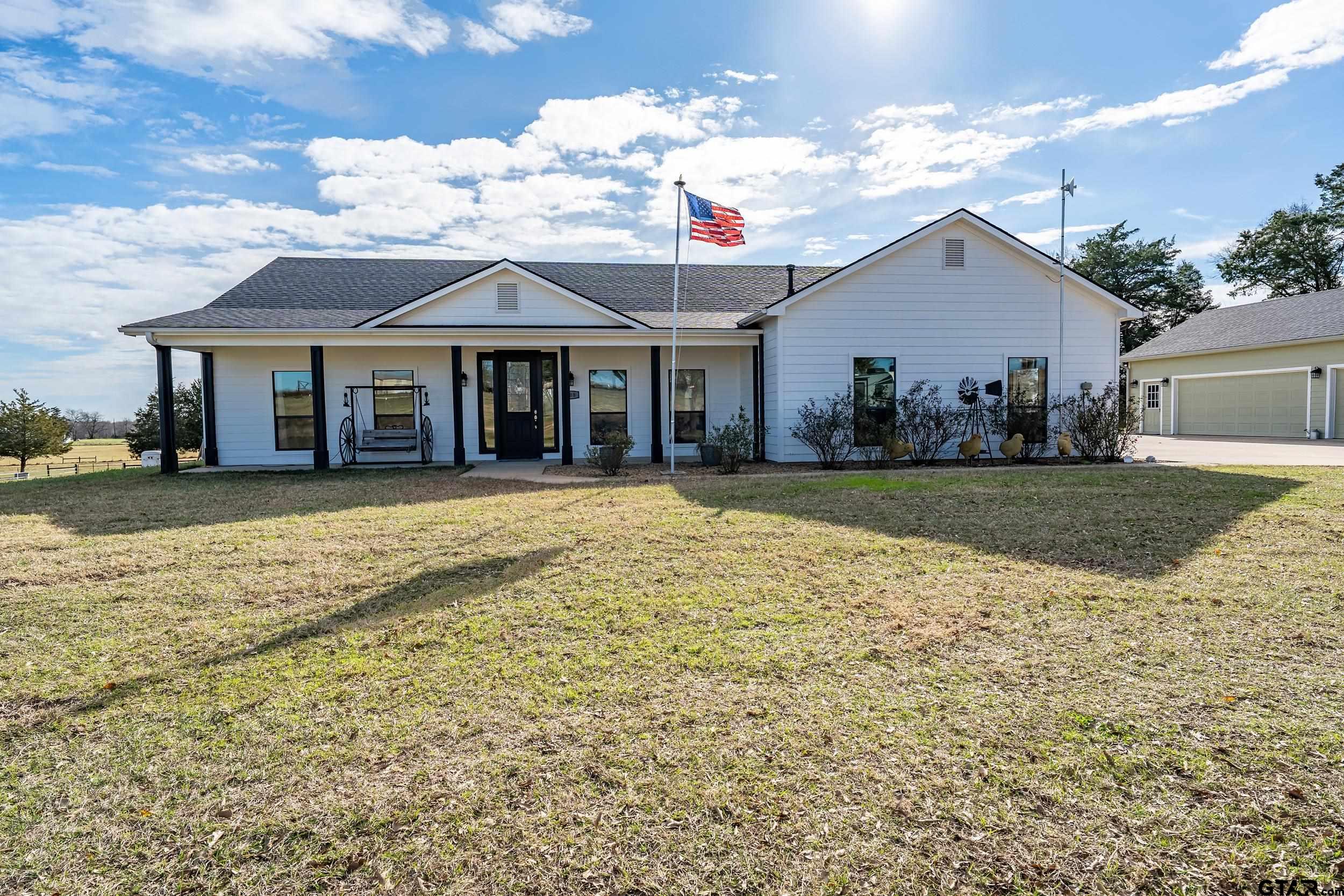 488 VZ County Road Ben Wheeler, TX 75754 - Photo 32 of 47 a view of a house with a yard and potted plants
