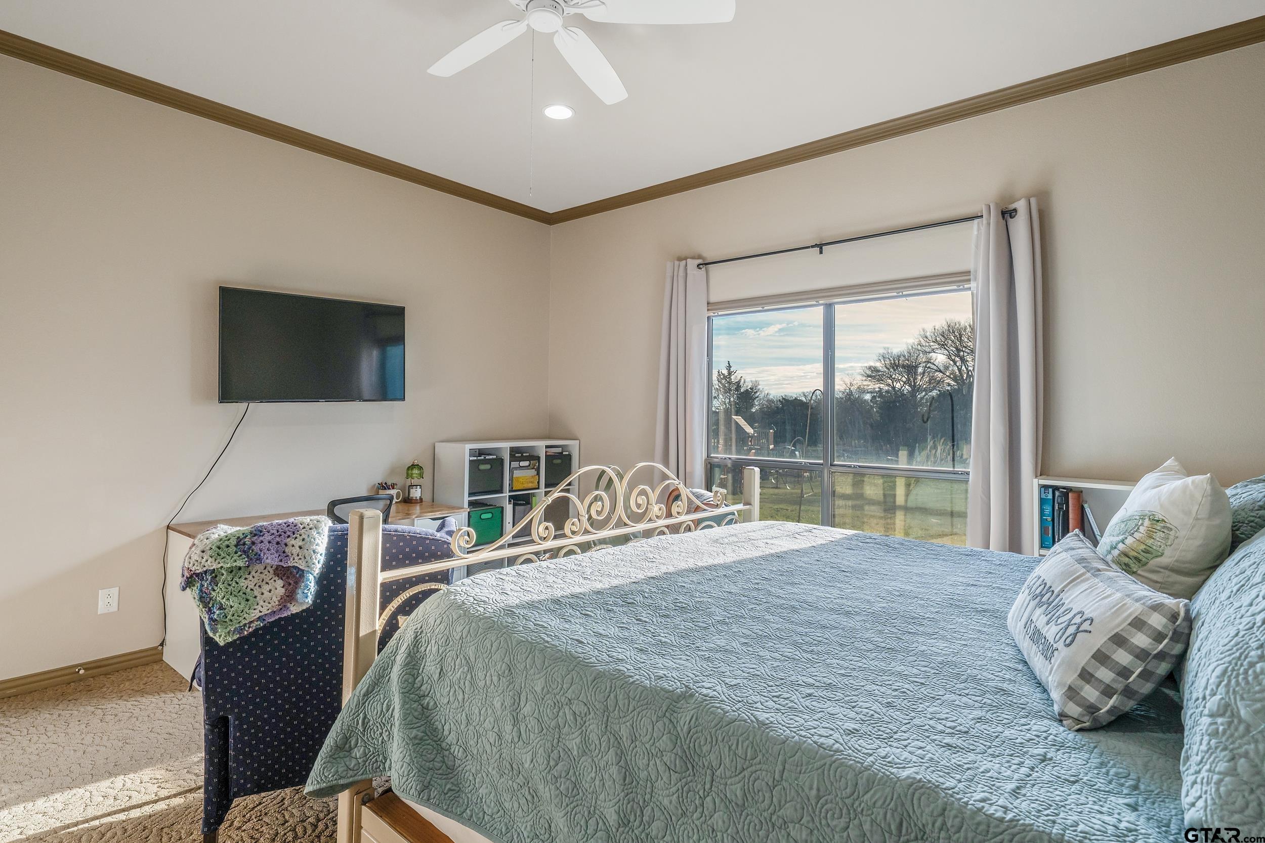 488 VZ County Road Ben Wheeler, TX 75754 - Photo 47 of 47 a bedroom with a bed and glass window