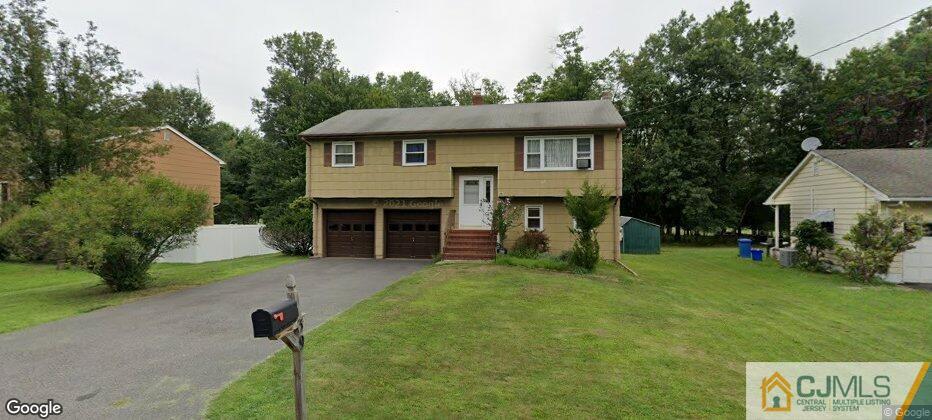 39 Bristol Road Piscataway, NJ 08854 - Photo 1 of 18 a front view of a house with a yard