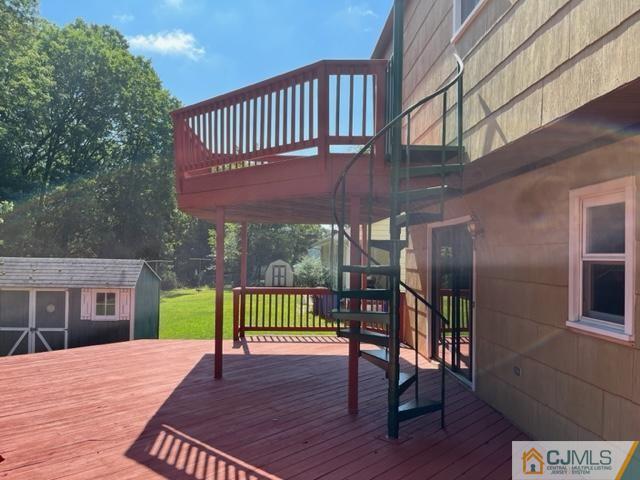 39 Bristol Road Piscataway, NJ 08854 - Photo 3 of 18 a view of a house with a deck