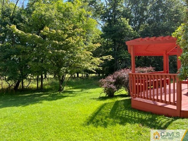 39 Bristol Road Piscataway, NJ 08854 - Photo 4 of 18 a view of a house with backyard and a tree