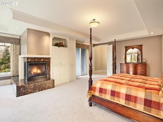 1186 Crestline Court Lake Oswego, OR 97034 - Photo 11 of 21 a bedroom with a bed and a fireplace