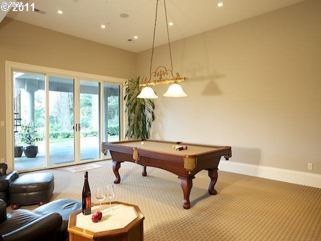 1186 Crestline Court Lake Oswego, OR 97034 - Photo 13 of 21 a living room with furniture and a large window