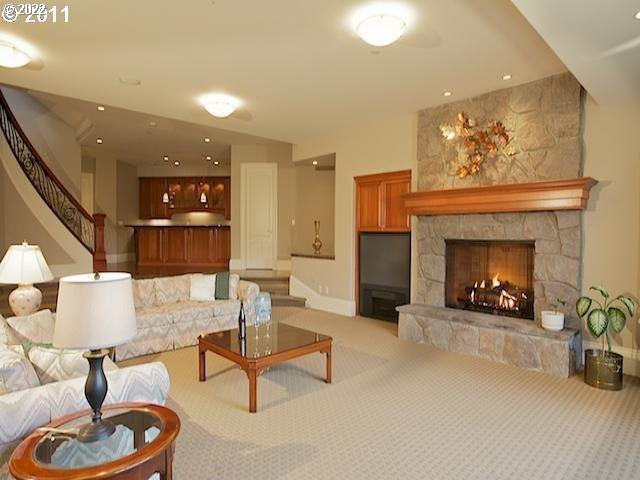1186 Crestline Court Lake Oswego, OR 97034 - Photo 16 of 21 a living room with furniture and a fireplace