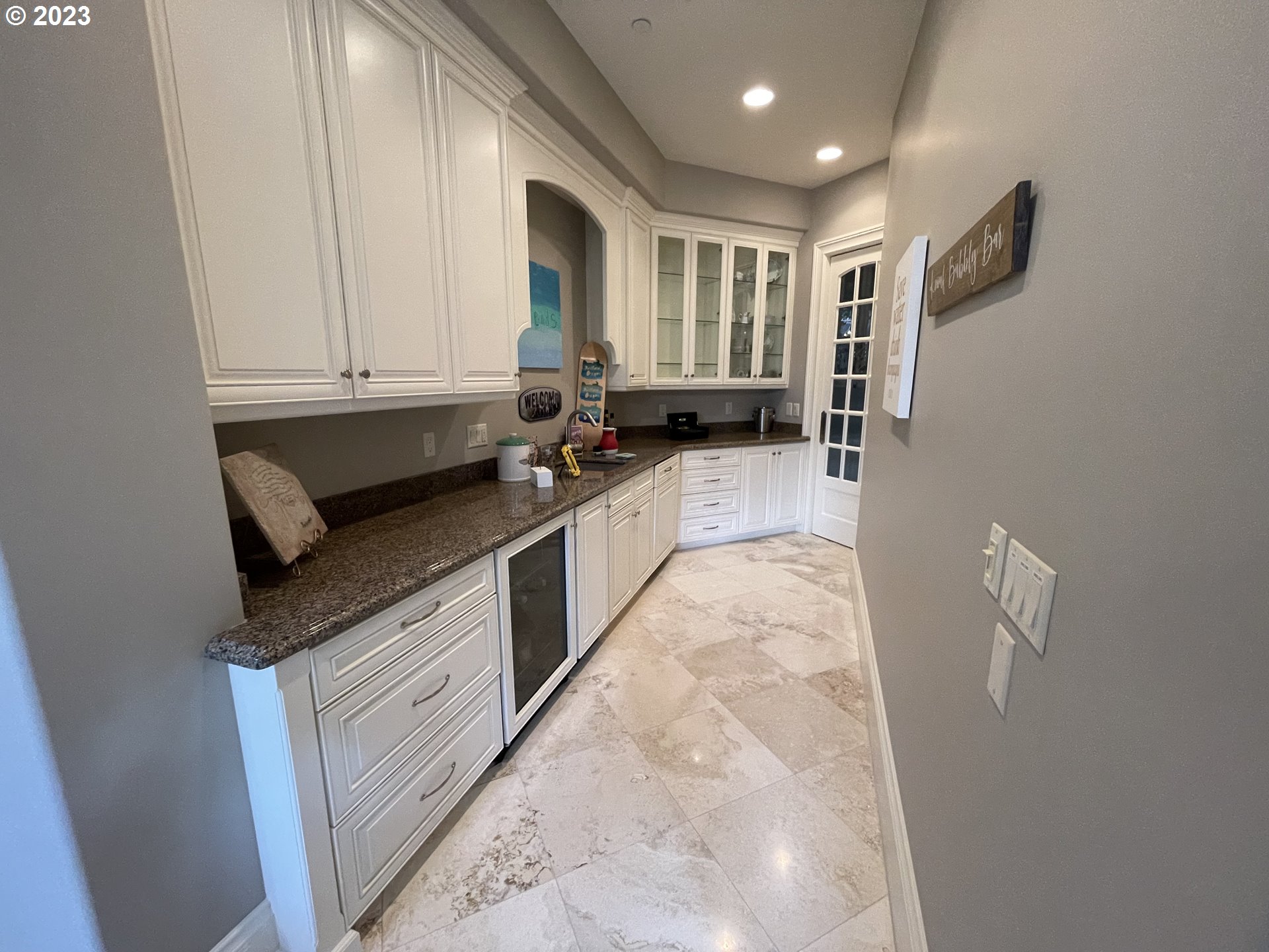 1186 Crestline Court Lake Oswego, OR 97034 - Photo 17 of 21 a kitchen with granite countertop a sink a stove and cabinets
