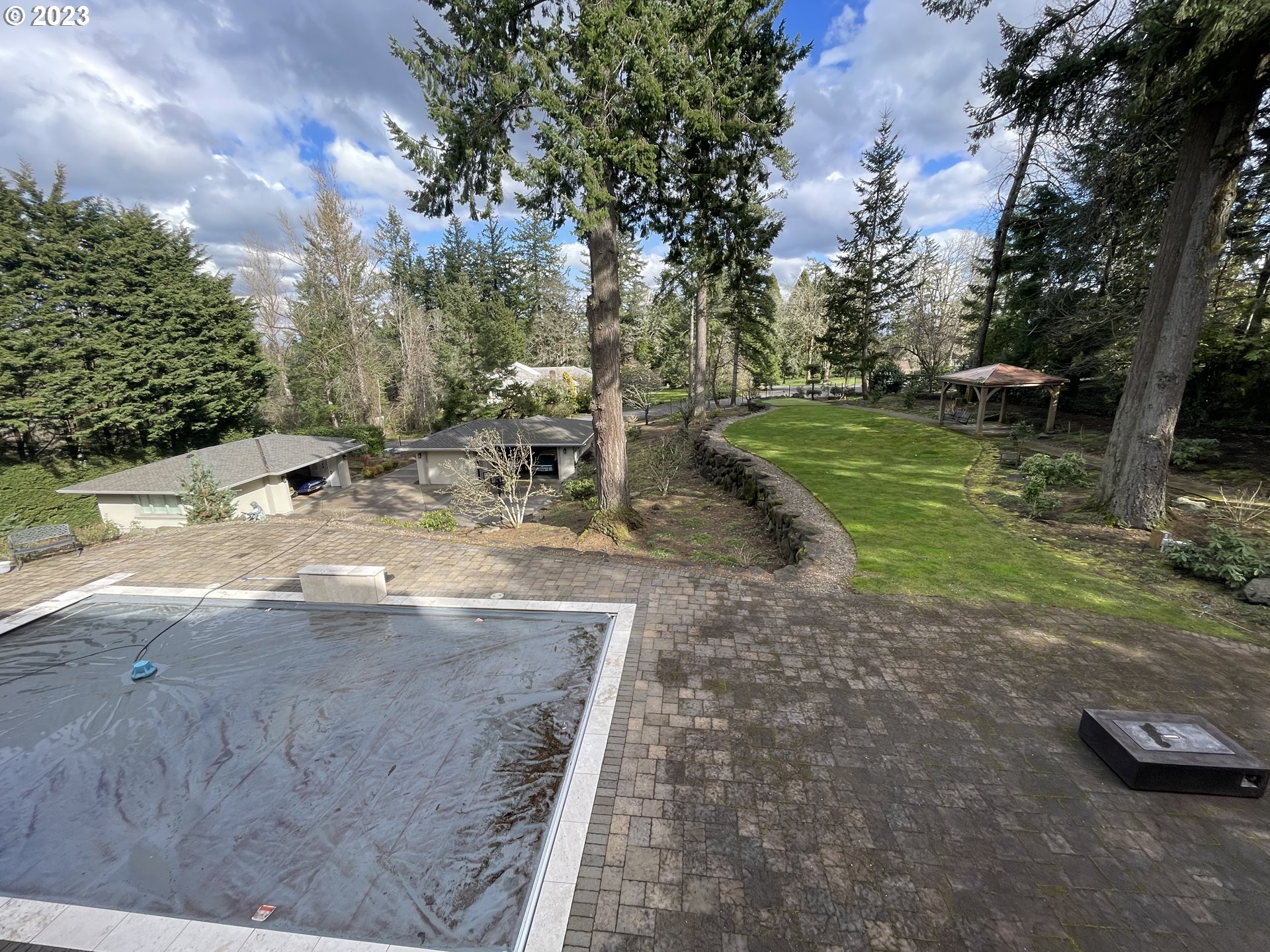 1186 Crestline Court Lake Oswego, OR 97034 - Photo 20 of 21 a view of a backyard with trees