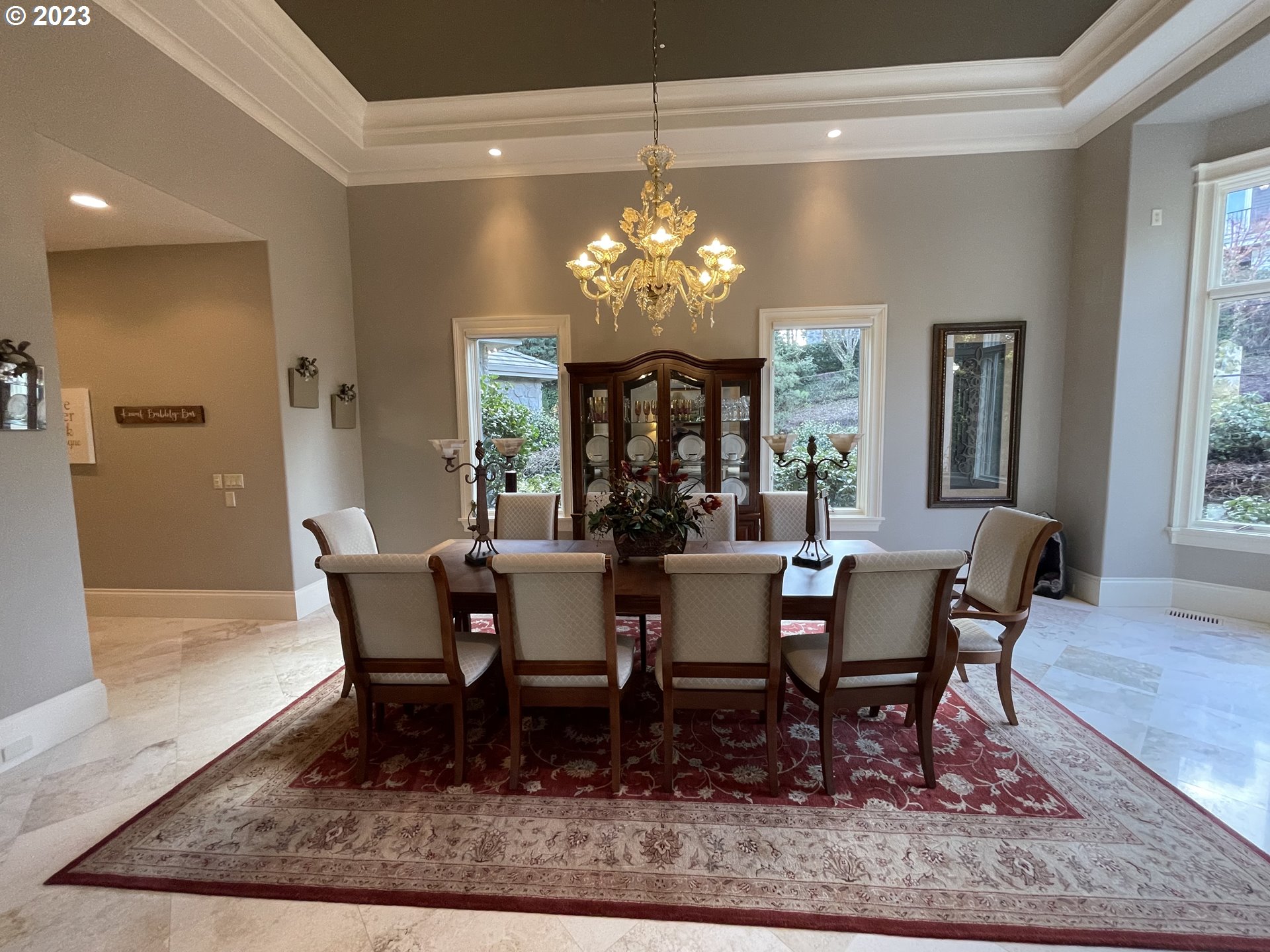 1186 Crestline Court Lake Oswego, OR 97034 - Photo 21 of 21 a view of a dining room with furniture and chandelier