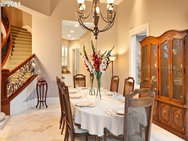 1186 Crestline Court Lake Oswego, OR 97034 - Photo 7 of 21 a view of a dining room with furniture and chandelier