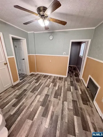 a view of a livingroom with a flat screen tv