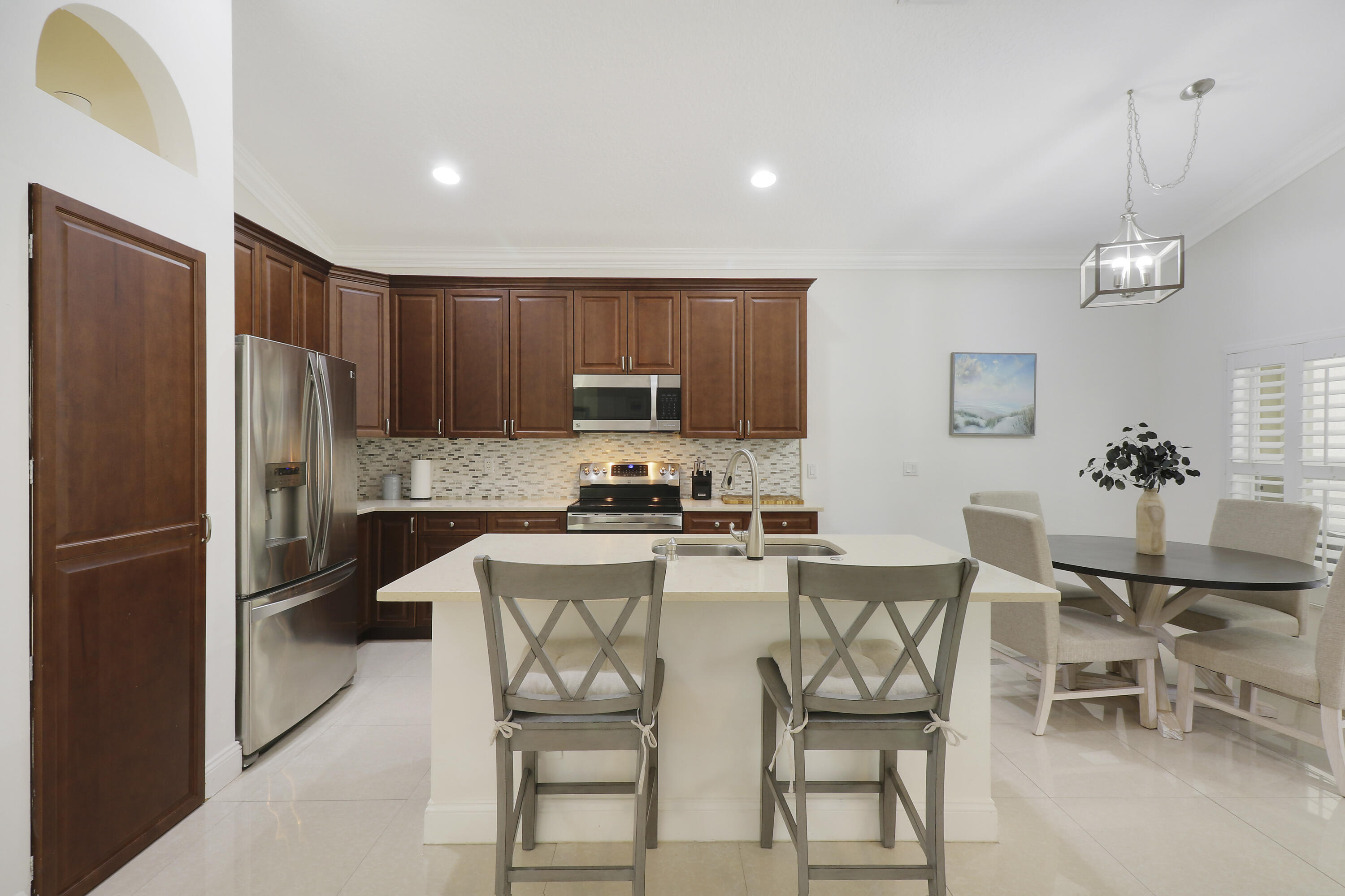 211 Pennock Trace Drive Jupiter, FL 33458 - Photo 10 of 39 Kitchen and Dining Area