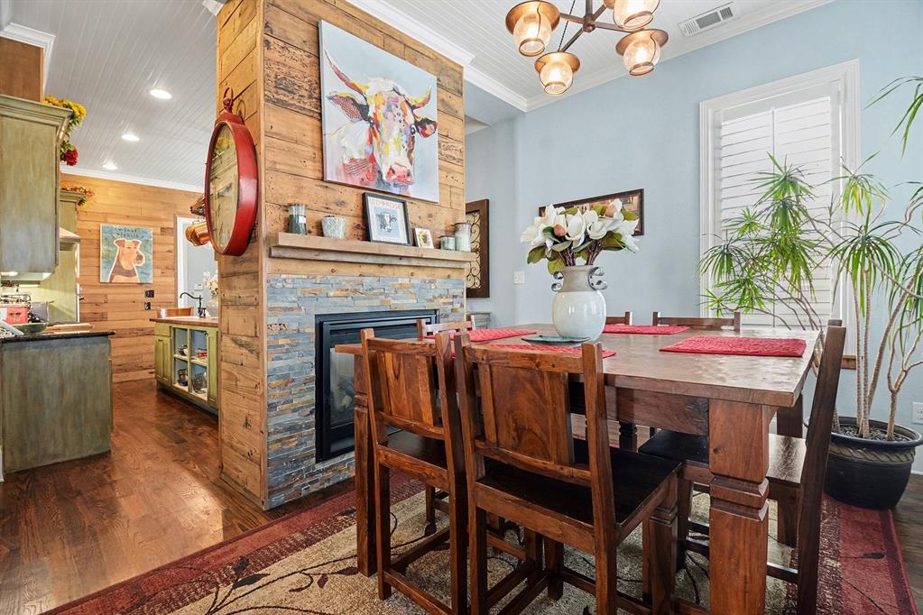 809 West Louisiana Street McKinney, TX 75069 - Photo 4 of 36 Dining Area with Double-sided fireplace.
