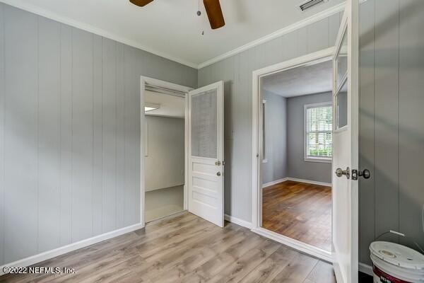 1752 Lilly Road East Jacksonville, FL 32207 - Photo 26 of 31 wooden floor and window in a room