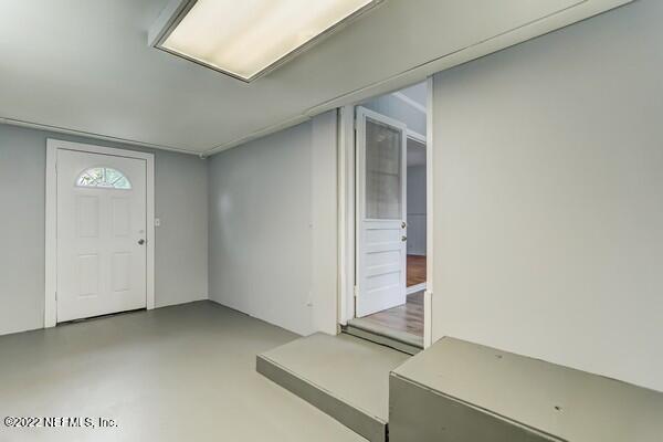 1752 Lilly Road East Jacksonville, FL 32207 - Photo 27 of 31 an empty room with windows