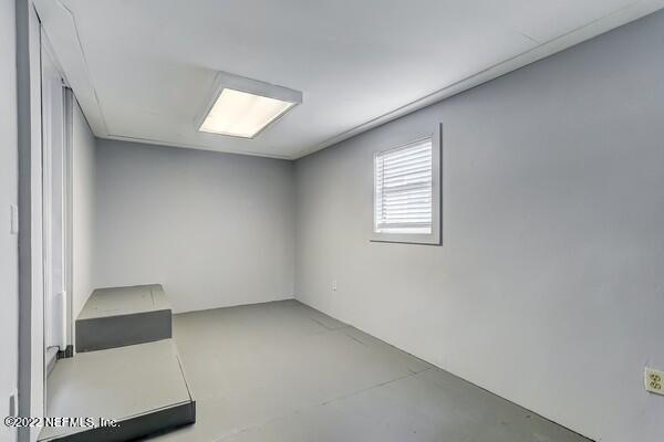 1752 Lilly Road East Jacksonville, FL 32207 - Photo 28 of 31 an empty room with windows