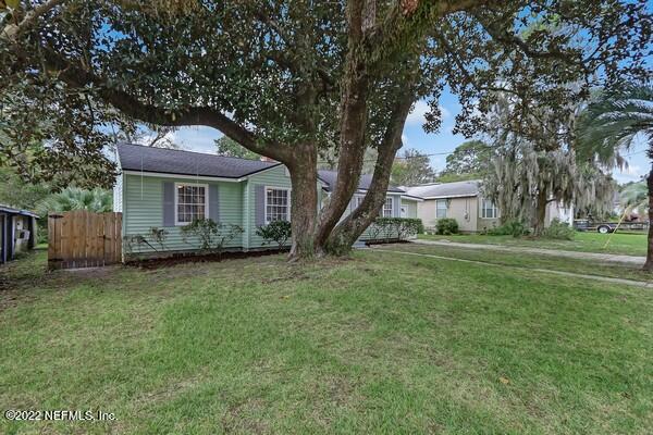 1752 Lilly Road East Jacksonville, FL 32207 - Photo 3 of 31 a house view with a garden space