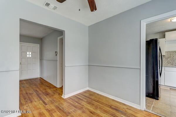 1752 Lilly Road East Jacksonville, FL 32207 - Photo 10 of 31 wooden floor in an empty room