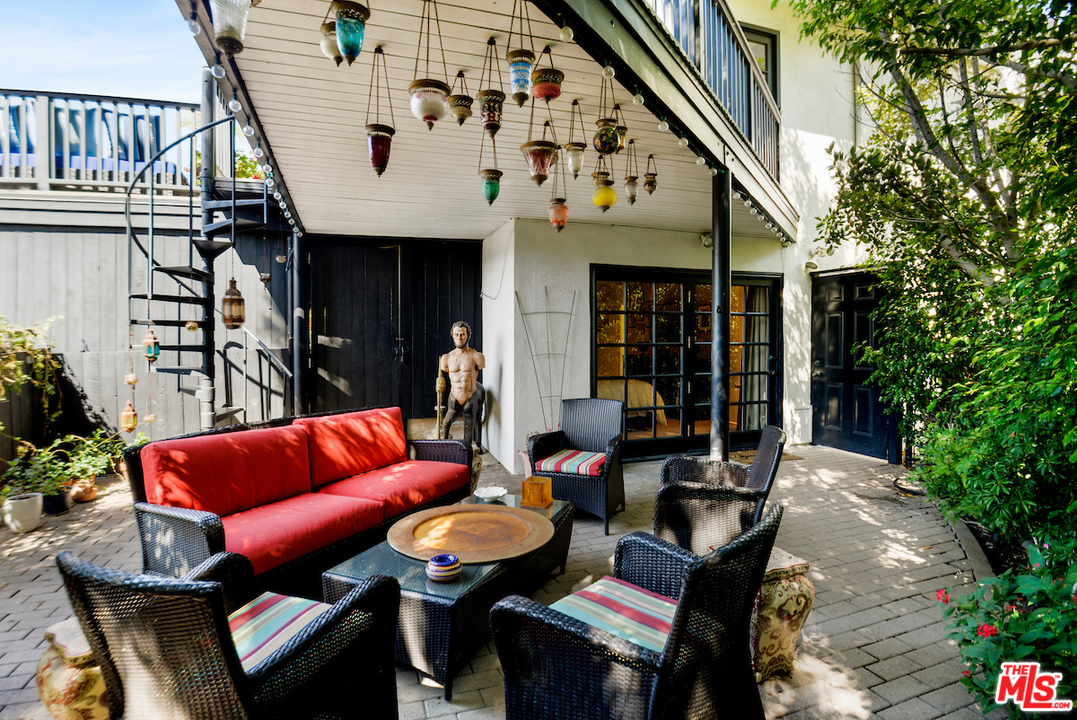 1077 Stradella Road Los Angeles, CA 90077 - Photo 22 of 25 a outdoor space with patio furniture