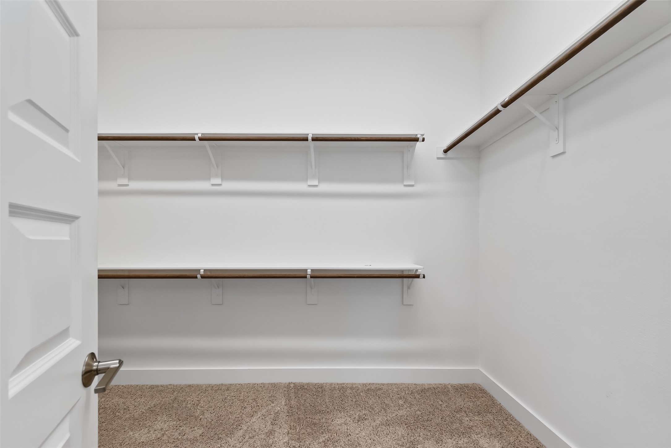 3415 Mckinney Ridge Drive Houston, TX 77059 - Photo 25 of 43 a view of an empty walk in closet