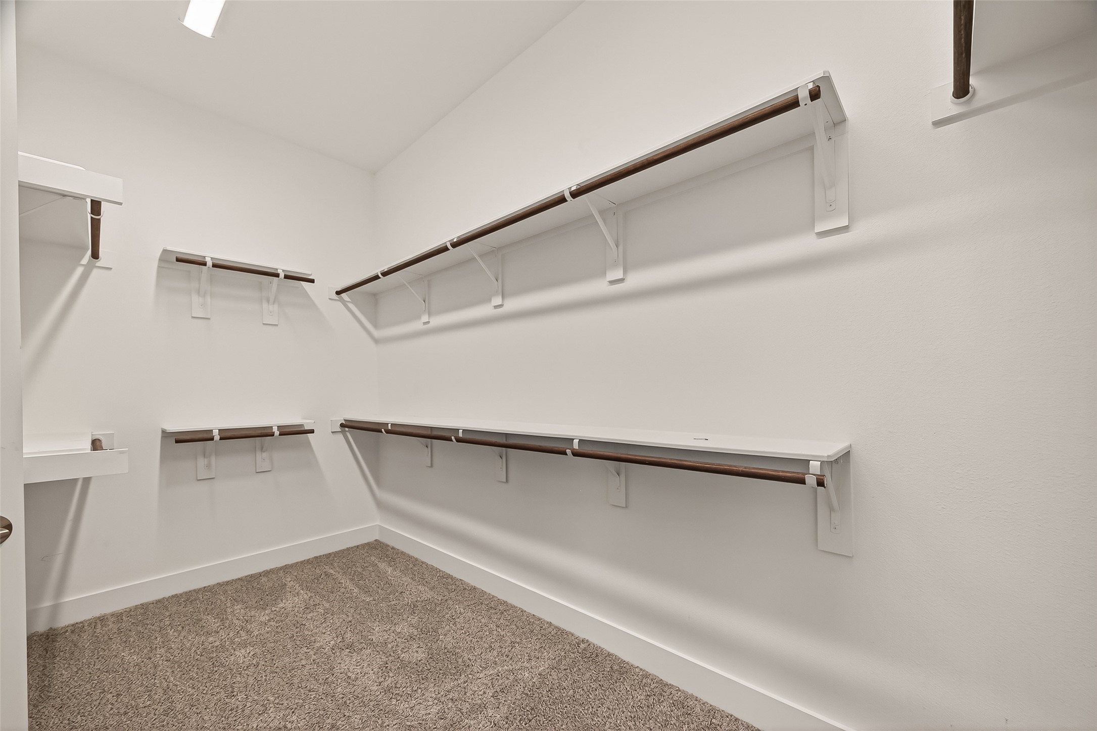 3415 Mckinney Ridge Drive Houston, TX 77059 - Photo 26 of 43 a view of an empty walk in closet