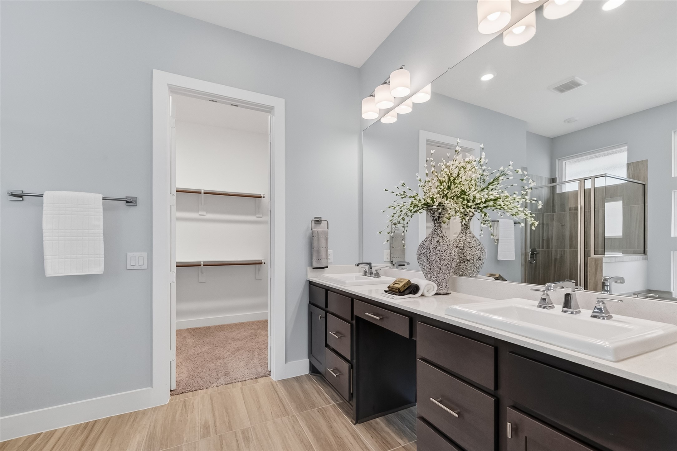 3415 Mckinney Ridge Drive Houston, TX 77059 - Photo 29 of 43 a bathroom with a sink double vanity and a mirror