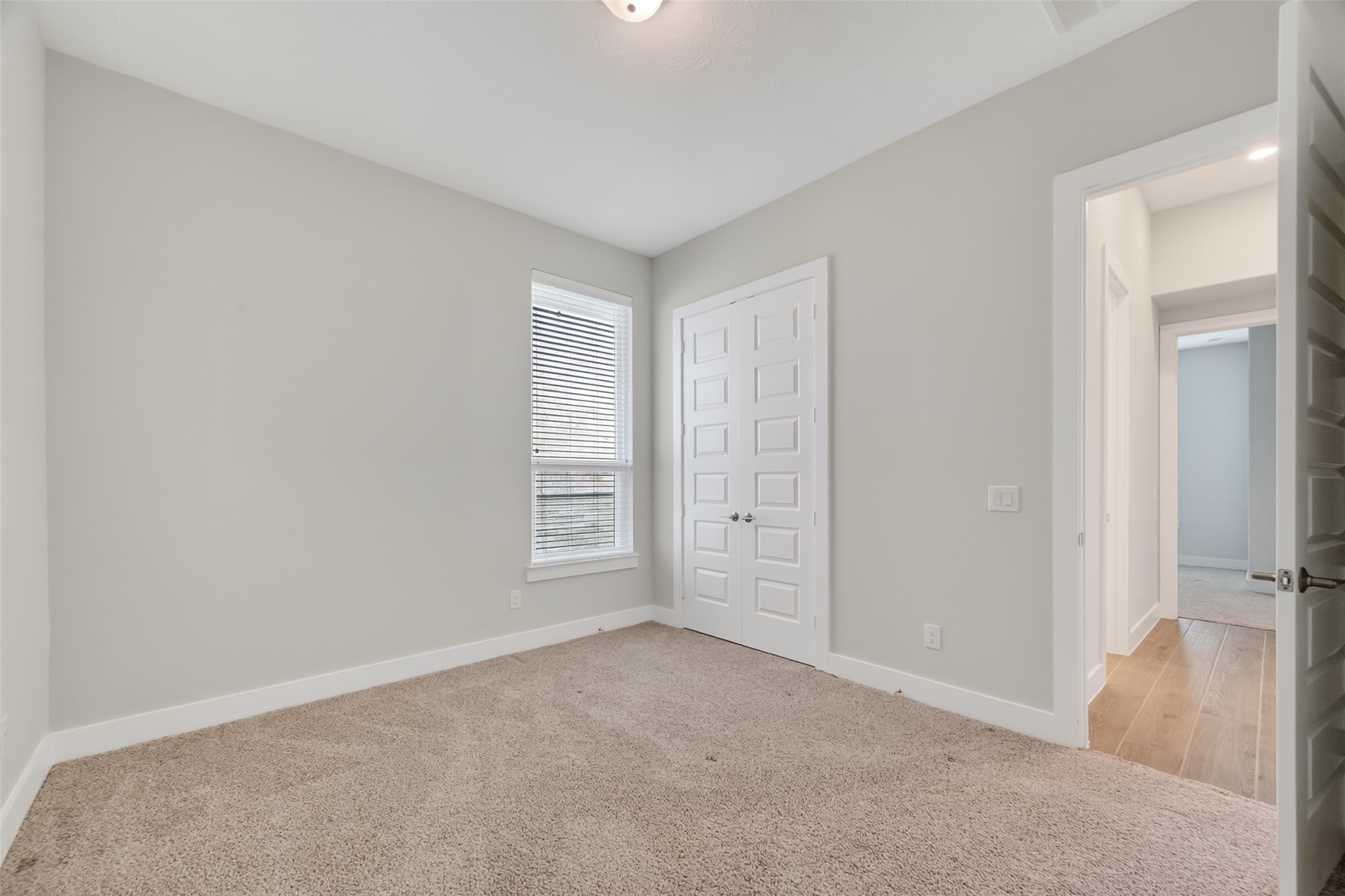 3415 Mckinney Ridge Drive Houston, TX 77059 - Photo 33 of 43 an empty room with windows