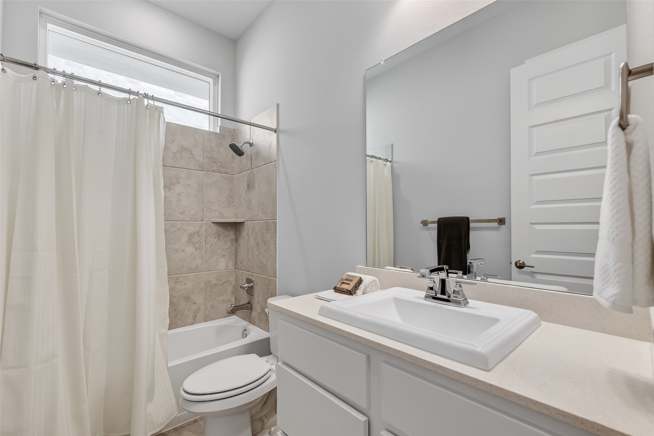 3415 Mckinney Ridge Drive Houston, TX 77059 - Photo 36 of 43 a bathroom with a sink toilet a mirror and shower