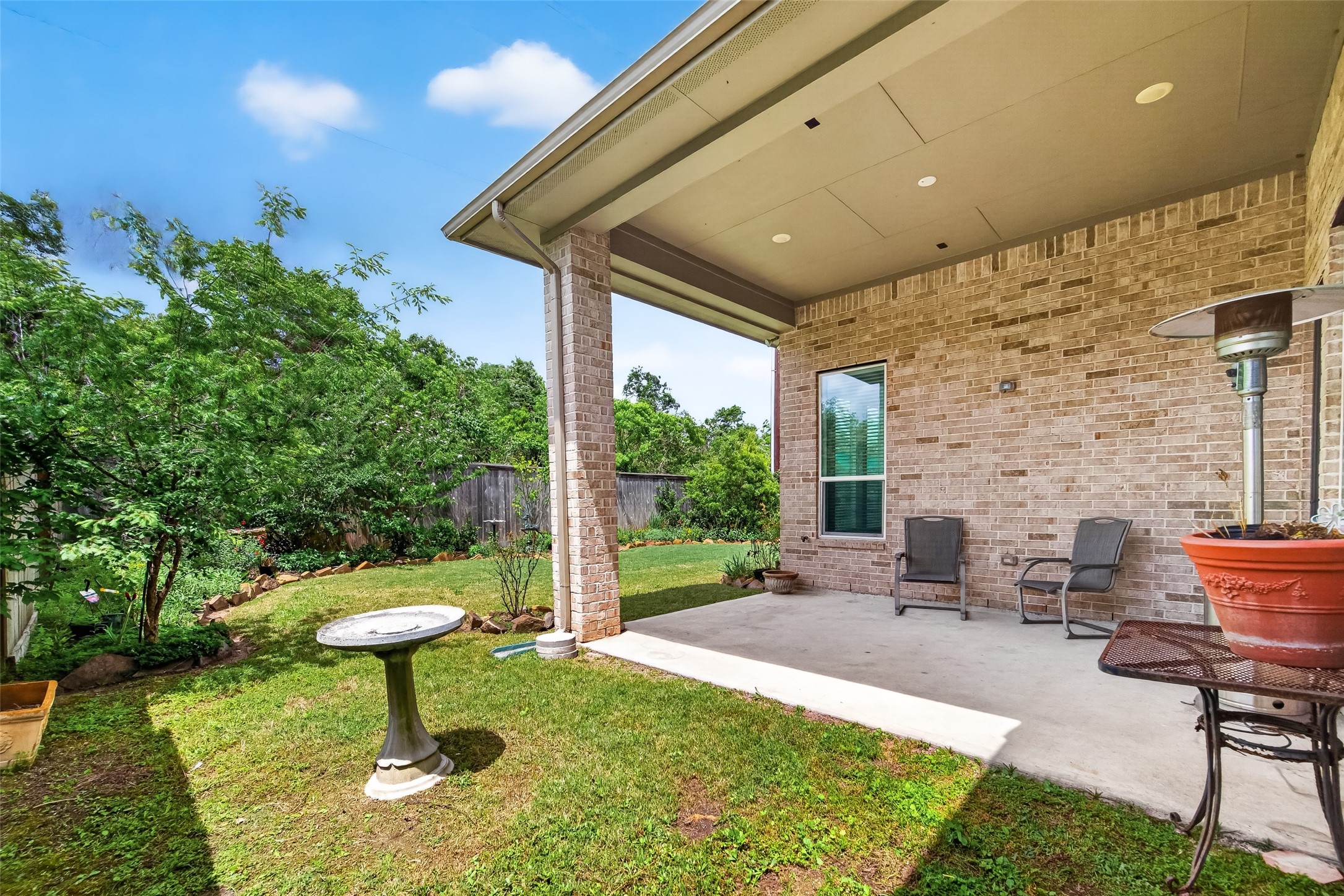 3415 Mckinney Ridge Drive Houston, TX 77059 - Photo 39 of 43 a view of a porch with furniture and a yard
