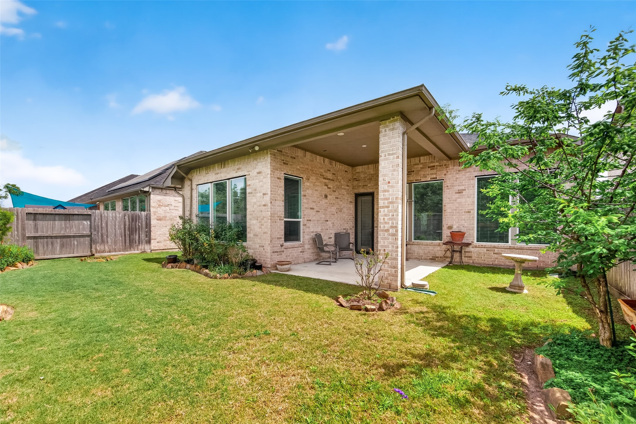 3415 Mckinney Ridge Drive Houston, TX 77059 - Photo 41 of 43 a view of a house with backyard and sitting area