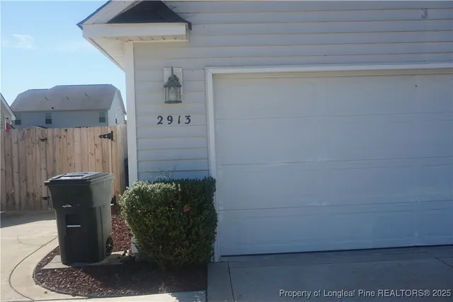 a street view with wooden fence