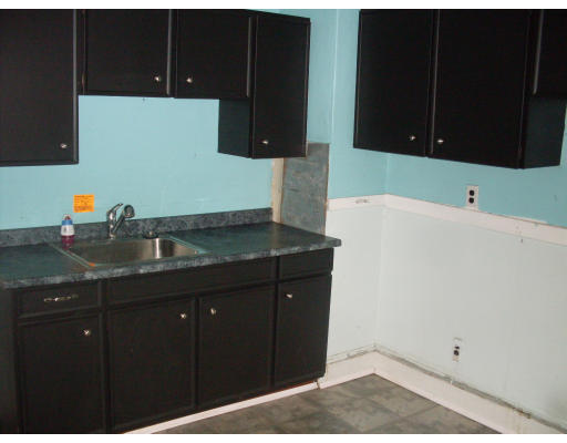 27 Eloise Street Springfield, MA 01118 - Photo 4 of 9 a kitchen with a sink and cabinets