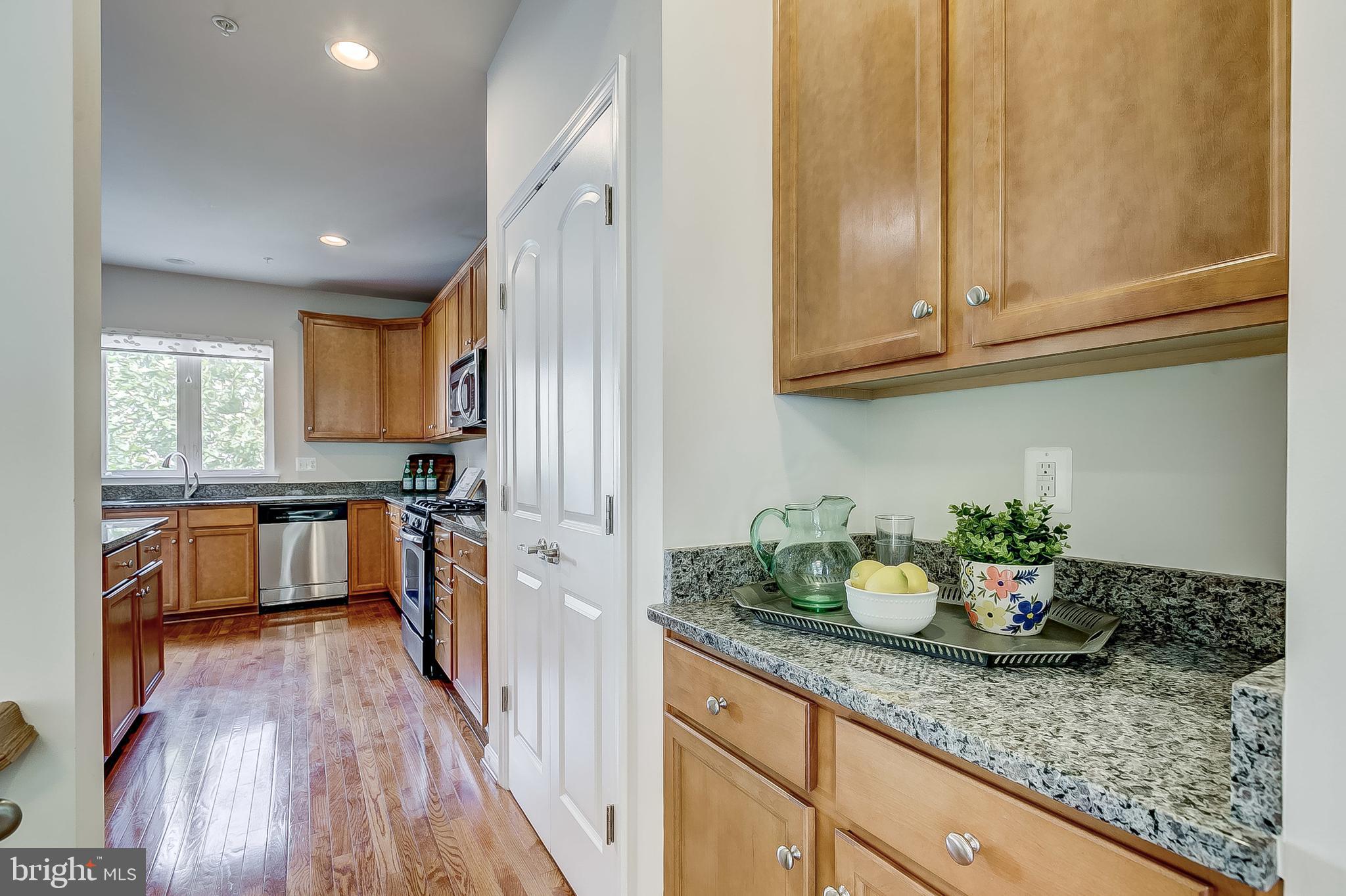 2704 Amber Crest Road Hanover, MD 21076 - Photo 15 of 48 Large pantry with matching counters & cabinets