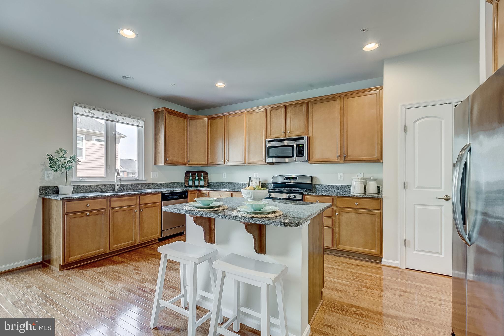 2704 Amber Crest Road Hanover, MD 21076 - Photo 9 of 48 Granite counter tops & center island