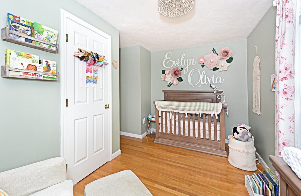 1 Hapgood Road Worcester, MA 01605 - Photo 16 of 34 a bedroom with furniture and wooden floor