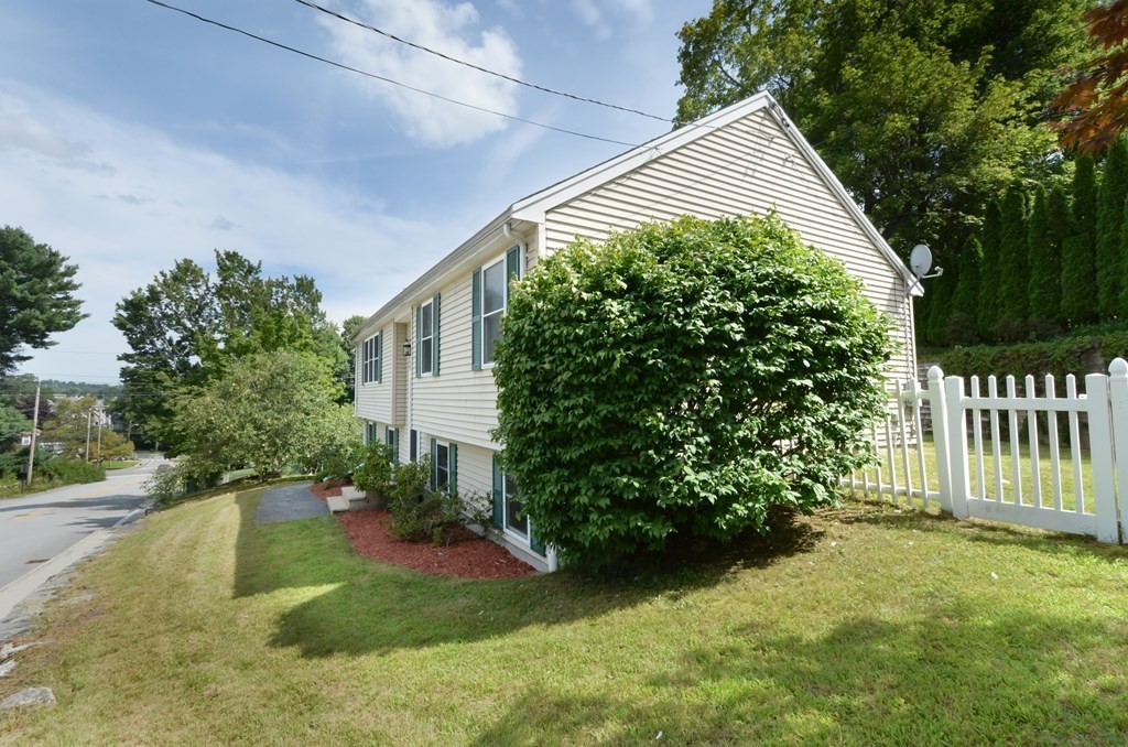 1 Hapgood Road Worcester, MA 01605 - Photo 3 of 34 a front view of a house with a yard
