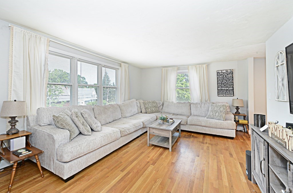1 Hapgood Road Worcester, MA 01605 - Photo 7 of 34 a living room with furniture and a large window